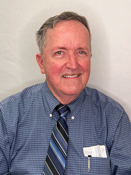 Dr. Gary Sigafoos, in-house periodontist at Bonita Family Dental in Bonita, CA, pictured in a professional portrait — a Temple University graduate with decades of periodontal expertise in the San Diego County area